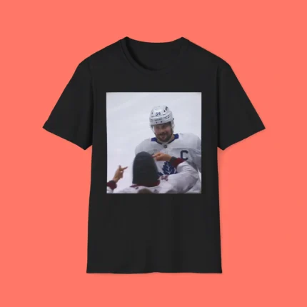 Auston Matthews Smirks At The Avs Fans Shirt